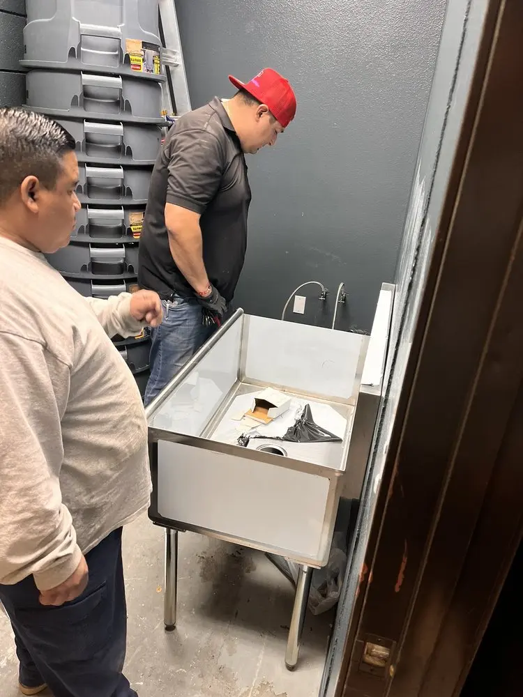 Commercial plumbing and sink installation in Wilson